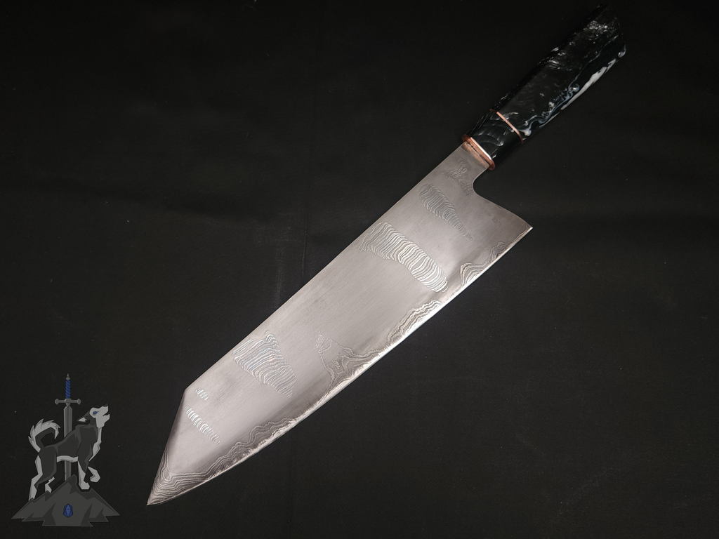 Chef knife with Damascus pattern laying on a dark background.